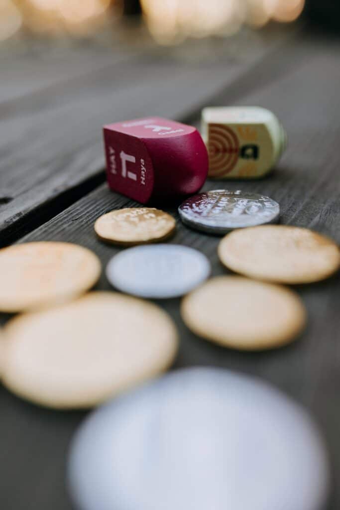 Image of dreidel and coins usually played during Jewish holidays.